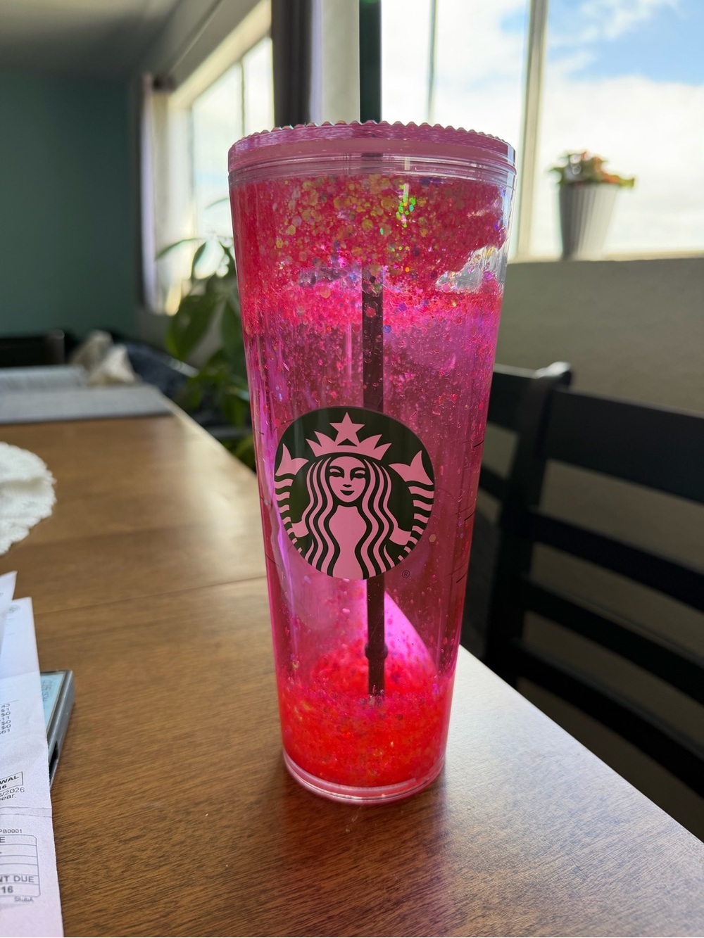 Pink bling venti reusable cup.